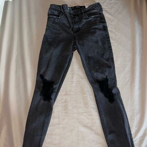 Selling hollister black ripped jeans!